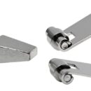 Con rullini di ritegno in acciaio inox.